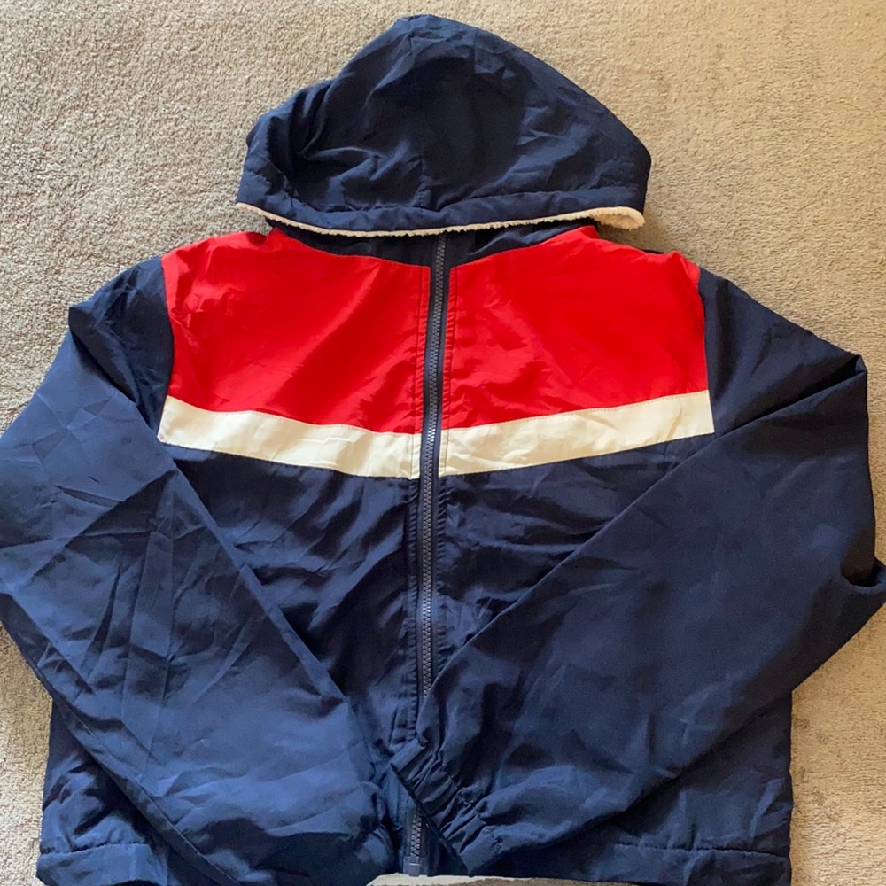 Blue with red and white stripe. Size M